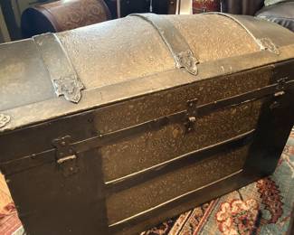 Round top antique trunk