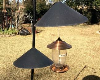 One of several bird feeders