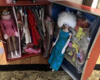 Dolls, trunk, and clothes