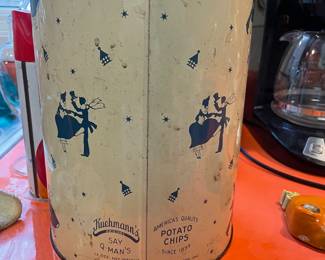 Vintage Q-man chip tin