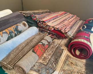 So many rugs! Many with tags