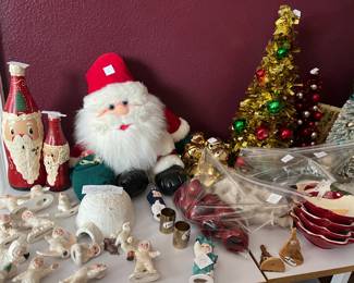 Pauline made these snow-babies.  Cute Coke bottle Santas and other Christmas.  Lots of napkin holders.