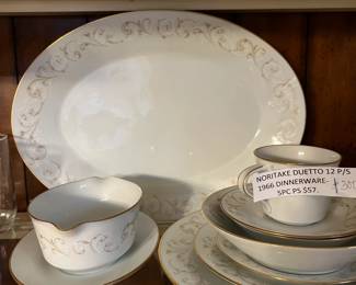 Noritake Duetto 12 place settings and  the serving pieces.  