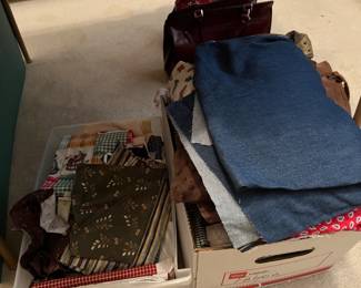 Upholstery and yards enough to make clothes.  SMALL QUILTING CLOTH SOLD.