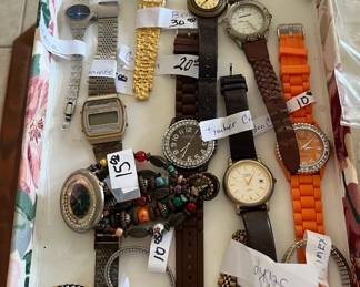Name brand watches: Guess, Bulova, Timex, etc.  Several Brightons.  Some vintage windups, other battery-operated.