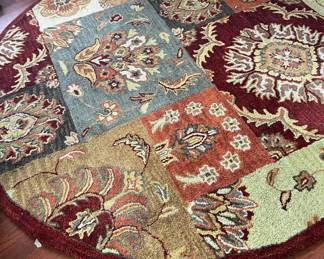 SEVERAL AREA RUGS.
