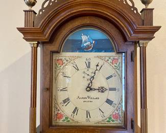 Detail of clock face.  Ship rocks back and forth on the waves as pendulum swings