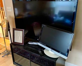 54" LG TV with remote, Media stand, 23” Vizio TV with remote