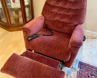 Foot rest raises and lowers