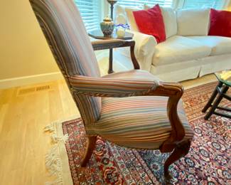 Side view of upholstered arm chair