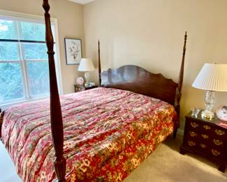 Henredon King size bedroom set excellent condition.  All wood pieces have protective glass tops.  King size bed, headboard and footboard poster bed, two nightstands, dresser, mirror and chest of drawers