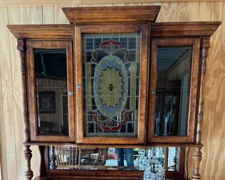 Apothecary custom built hutch and cabinet with stained glass panel