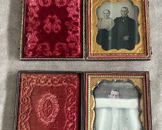 Antique daguerreotypes in leather bound cases with brass and velvet inlay