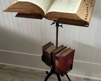 Antique thesaurus and books on metal stand