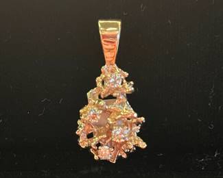 Diamond and gold pendant