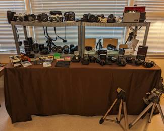 Canon, Vivitar, Polaroid cameras and accessories.