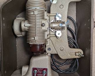 Bell and Howell film projector with metal case
