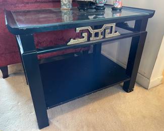 Asian inspired painted black side table with glass top