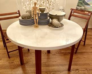 Modern 40 inch round dining room table, white top, wooden legs
