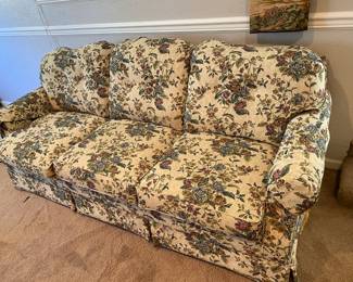 White/Multicolored Floral Couch