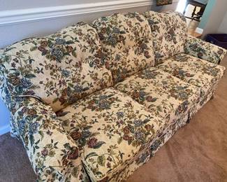 White/Multicolored Floral Couch