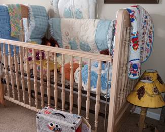 Baby bed and linens. 
