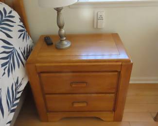 One of two matching nightstands.