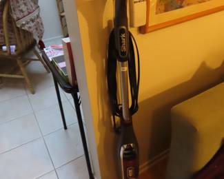 Shark floor steamer.