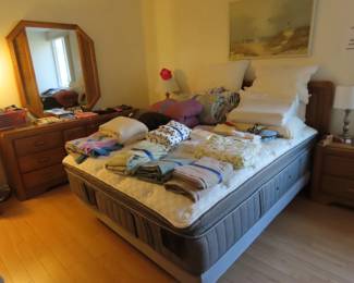 Bed linens, adjustable bed, comforters, pillows and blankets.