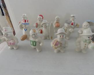 Lenox snowman figures one for each month and the holidays and the seasons.