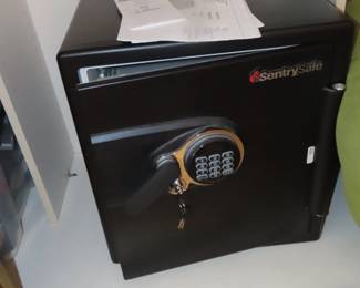 Large Sentry safe  with combo and keys.