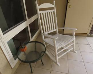 Lovely like new white rocking chair. and metal/glass end table.