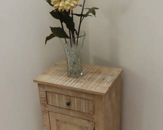 Bare unfinished wood nightstand/end table/cabinet.