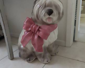 Large ceramic floor statue of dog.