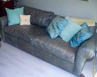 Leather couch and decorative pillows