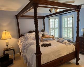 Grandiose carved mahogany queen sized canopy poster bed