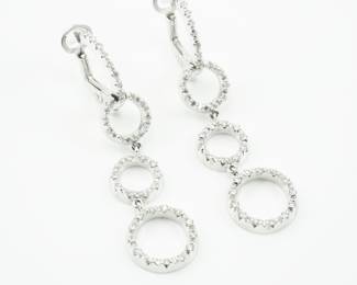 18k White Gold & Diamond Earrings. There is one Pink  Sapphire on the back of the top ring.