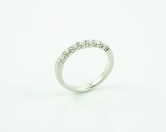 Exquisite 7 diamond band set in Platinum.