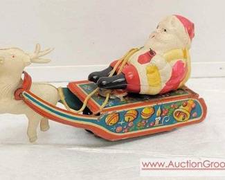 14 Celluloid Santa and Reindeer tin friction sleigh circa 1940s