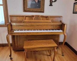 15 Kawai Piano and Bench. Includes Sheet Music in Bench.