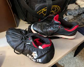 Bowling balls, rack, shoes, bowling bags