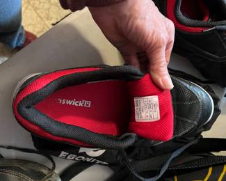 Bowling balls, rack, shoes, bowling bags