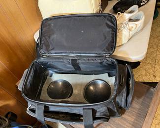 Bowling balls, rack, shoes, bowling bags