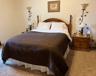 Queen bed with bedding