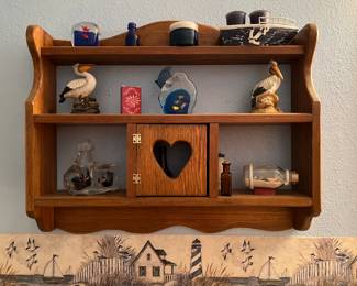 What not shelf full of beach related items