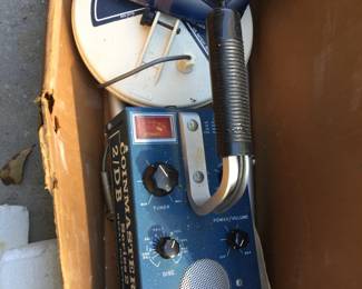Vintage metal detector in box with manual.