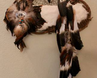 Native American handmade wall decor with feathers