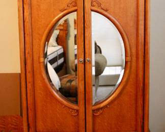 Large mirrored vintage storage cabinet