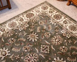 Large decorative green area rug