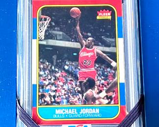 Michael Jordan Card 1986 Fleer Rookie Card. Near mint to mint condition with perfect corners. PSA 8. The greatest player and most significant card of all time!! For more information on this card call 480-577-8396 or text. It will not be physically at the sale.